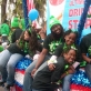 Crew Members And Family Taking A Break On The Back Of The Float